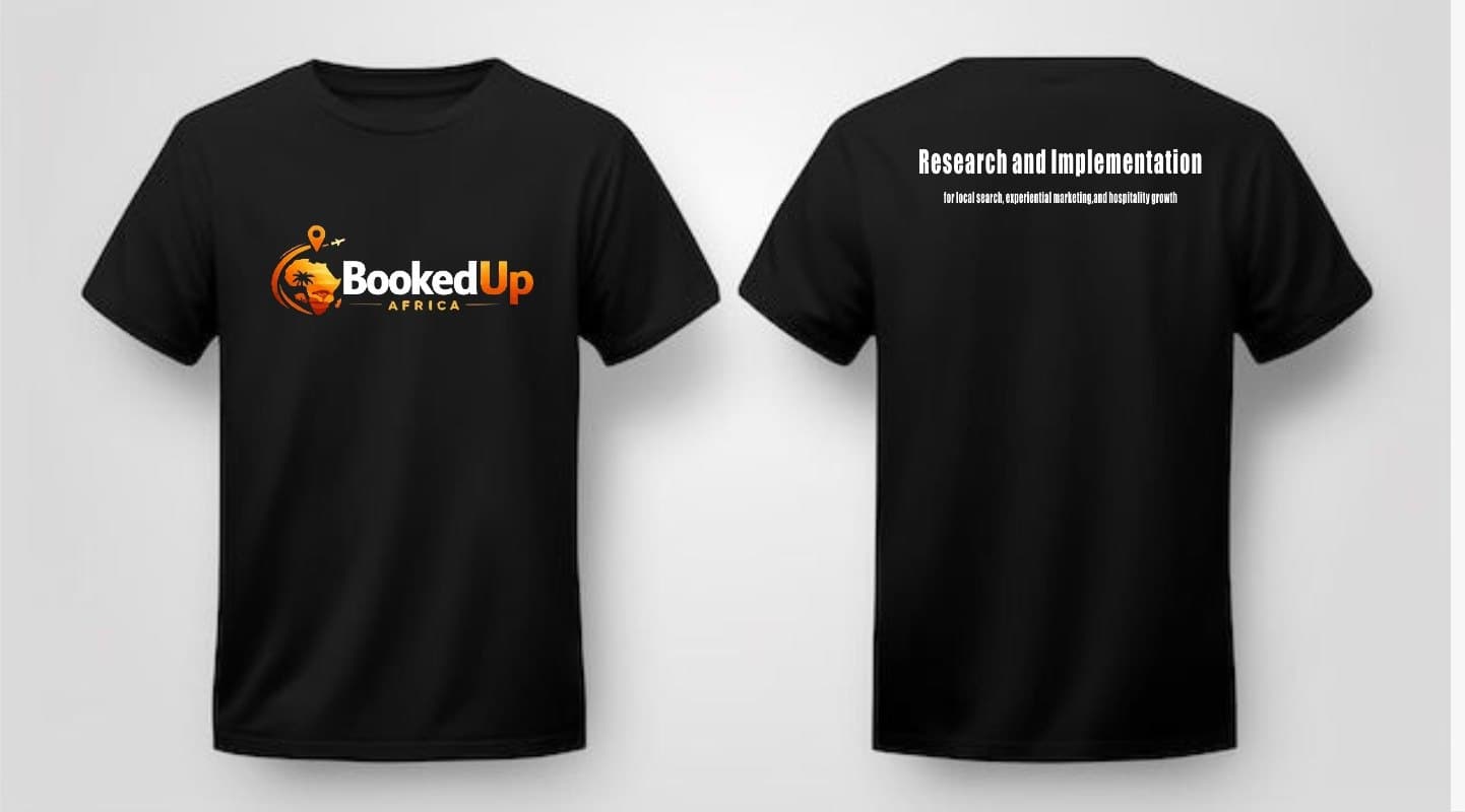 Black BookedUp Africa t-shirt, front with the logo and back reading "Research and Implementation for local search, experiential marketing, and hospitality growth" in a bold condensed font
